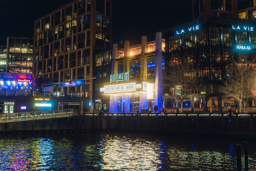 The Anthem music venue illuminated at night along the waterfront at The Wharf in Washington, DC.
