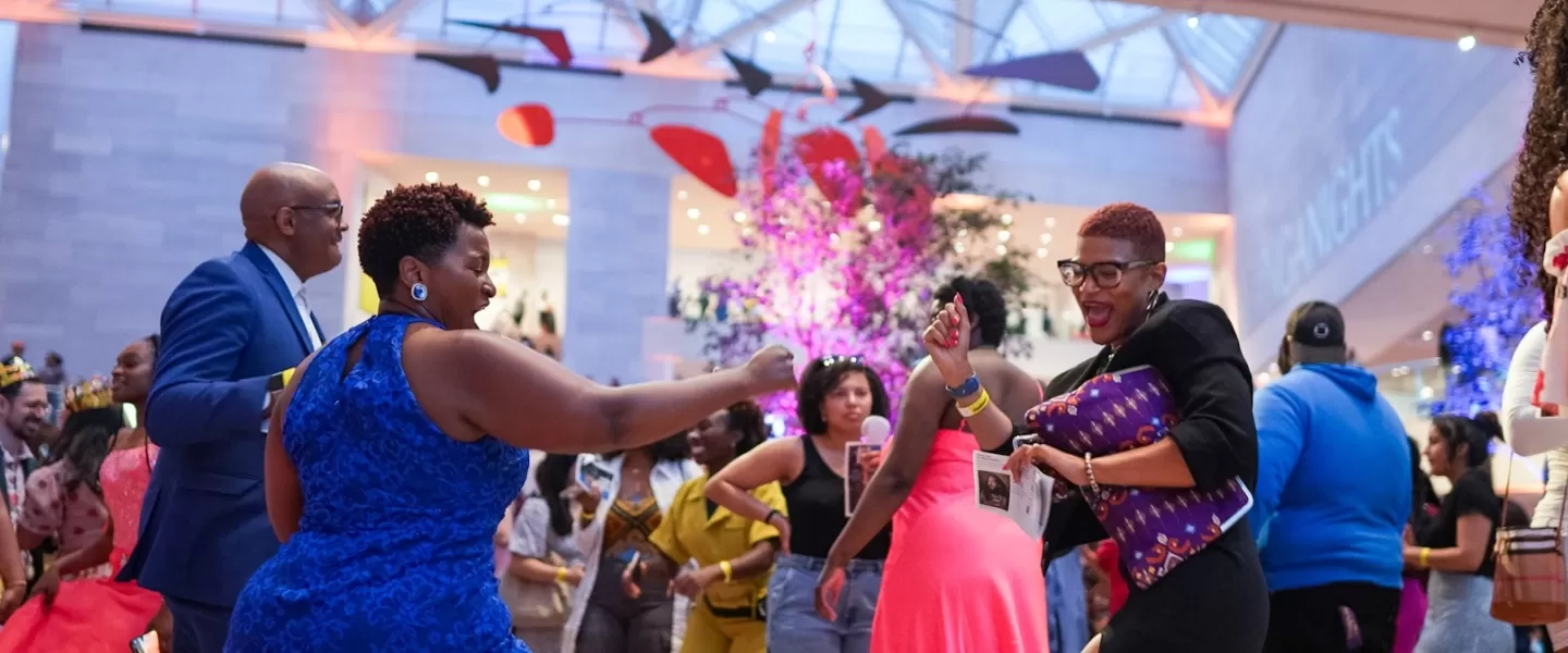Guests dance and celebrate during a lively event at the National Gallery of Art in Washington, DC.